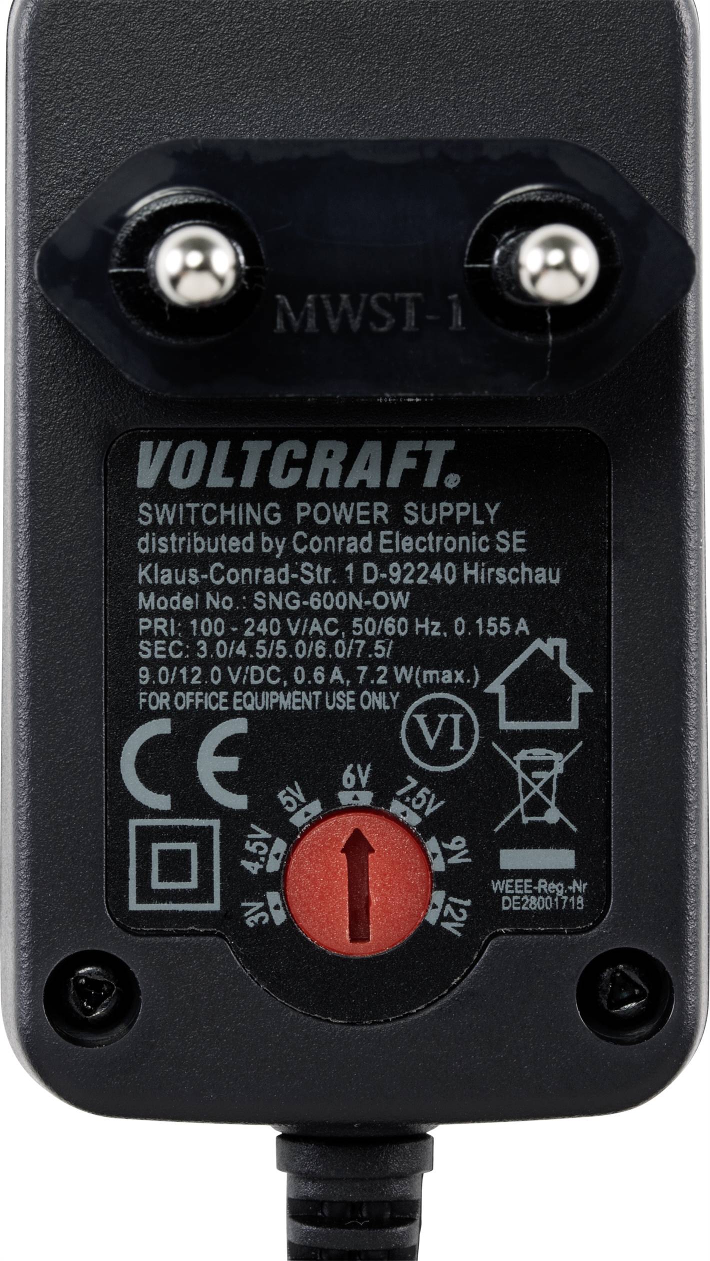 Czarny zasilacz, marka 'Voltcraft', model SNG-600N-OW. Napięcie wyjściowe regulowane od 3 do 12V. Maks. 600 mA.