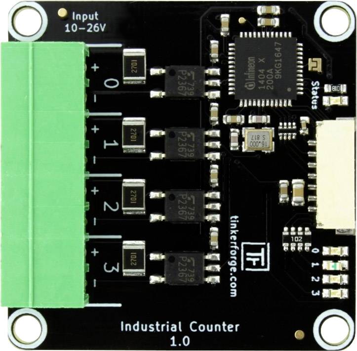 Przemysłowa płytka drukowana z zielonym blokiem przyłączeniowym po lewej stronie, kilkoma czarnymi chipami po prawej stronie oraz oznaczeniami wejść 0-4.