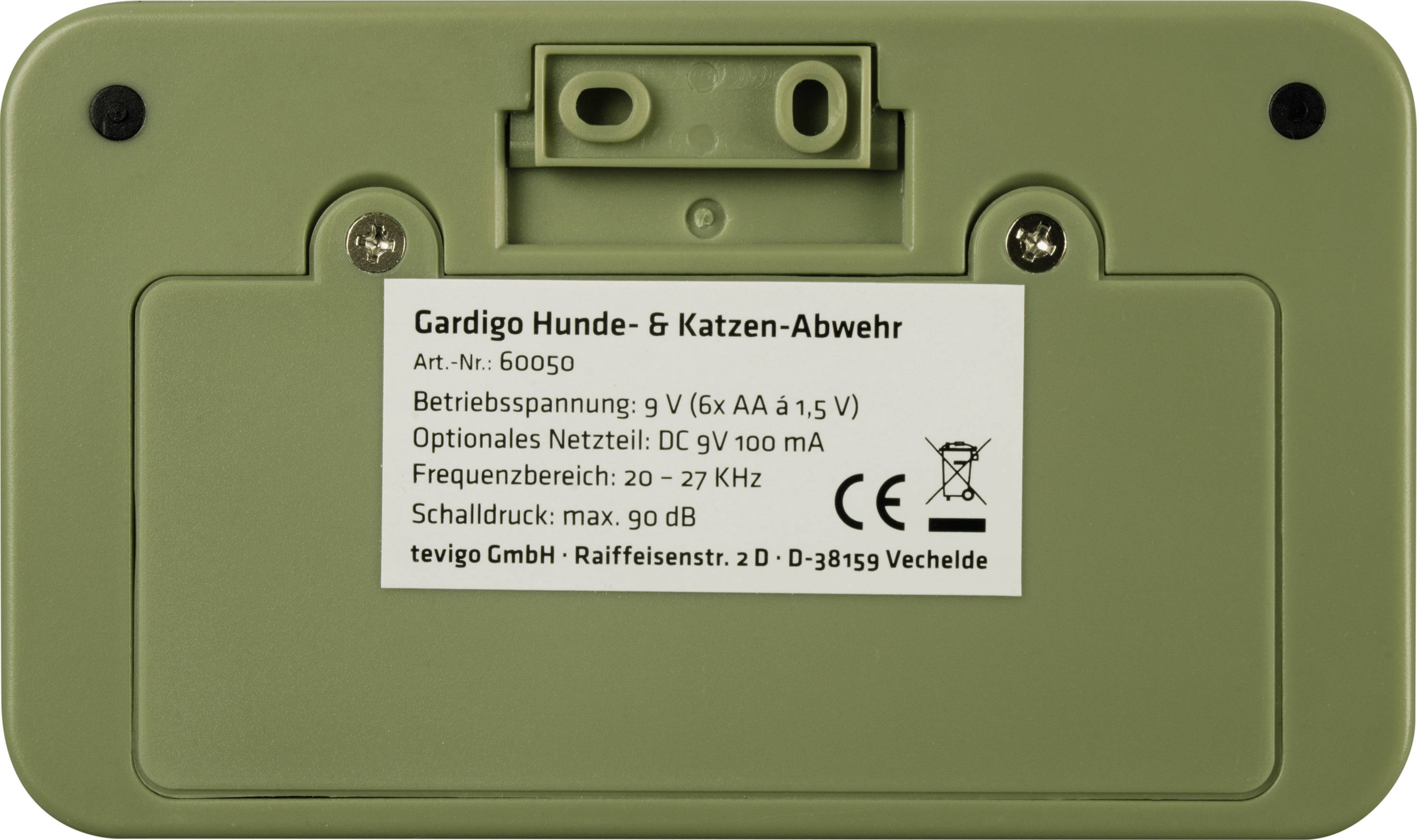 Zielone urządzenie z naklejką 'Gardigo Odstraszacz psów i kotów'. Zasilane baterią 9V. Zakres częstotliwości: 20-27 kHz. Maksymalne ciśnienie akustyczne: 90 dB.