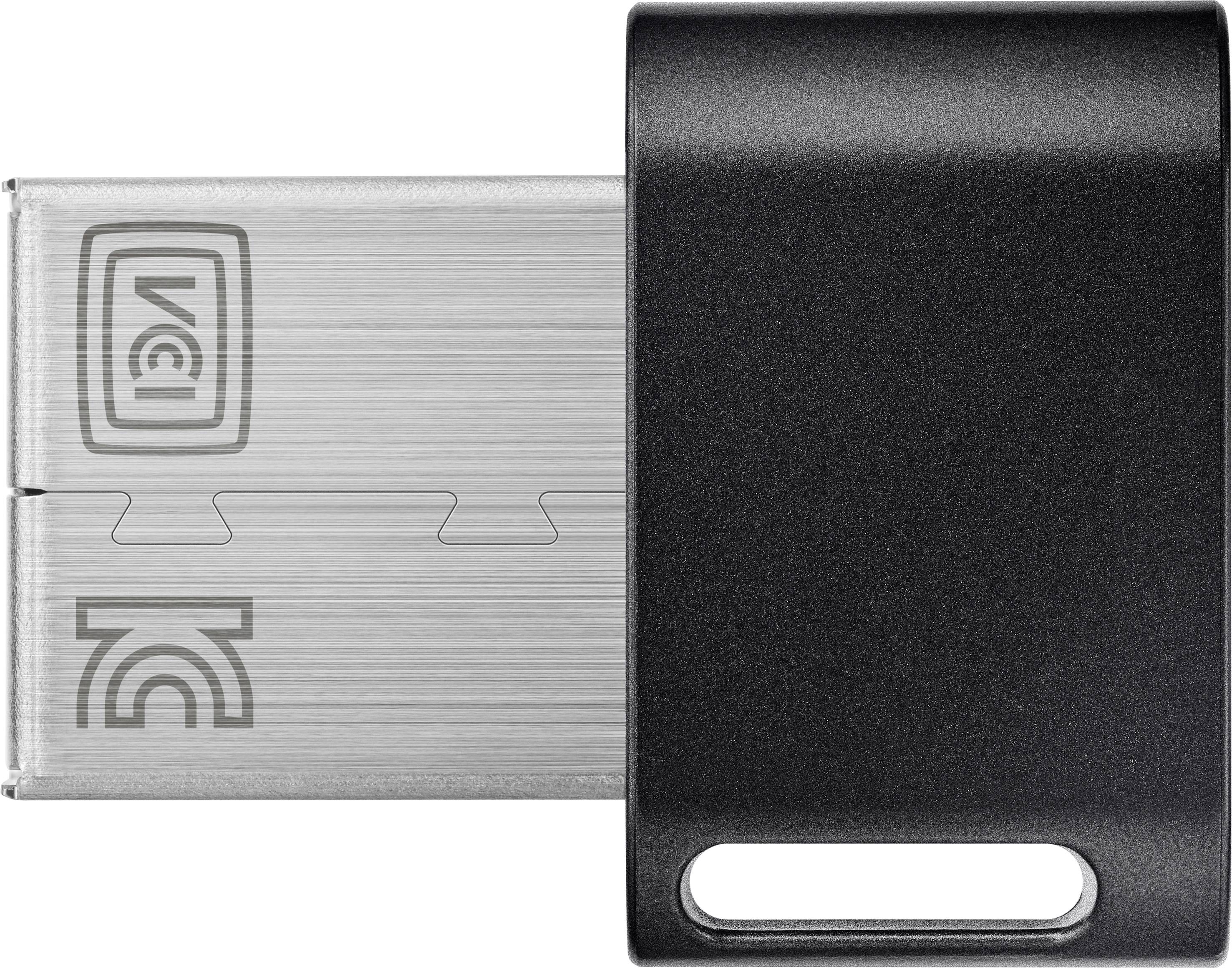 Srebrny pendrive z czarną nasadką, częściowo wysunięty, prezentuje logo marki i napis 'VG' na metalowej stronie.