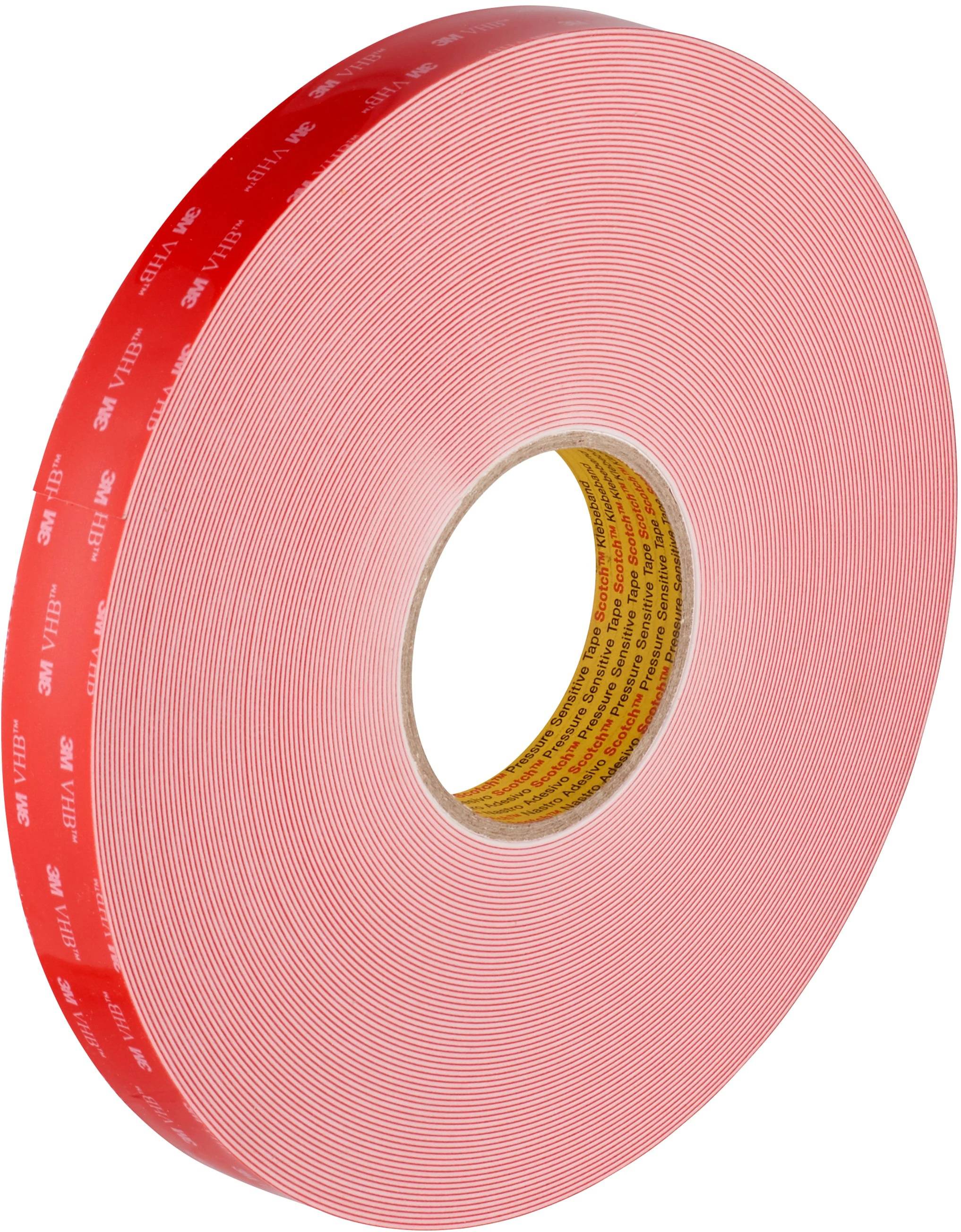 Duża rolka mocnej, czerwonej taśmy dwustronnej, odpowiedniej do wymagających zastosowań mocujących.