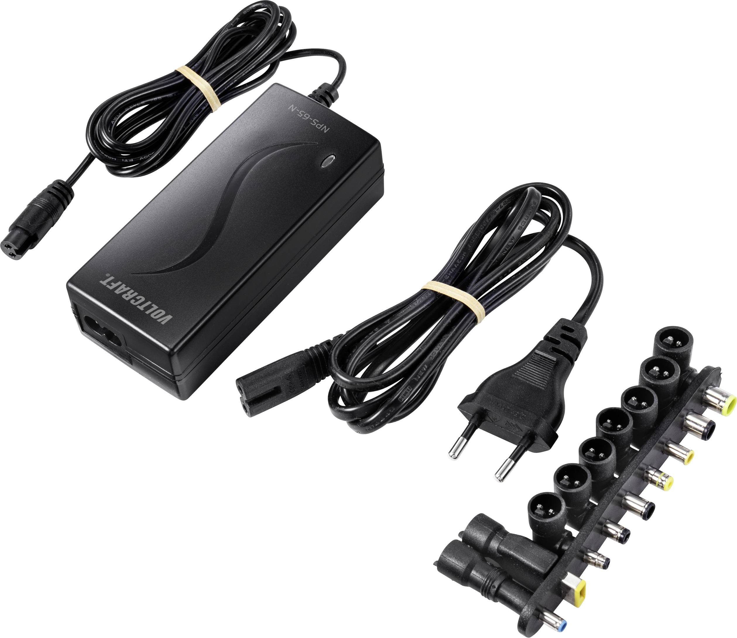 Czarny uniwersalny zasilacz do laptopa z różnymi wymiennymi złączami i odłączanym przewodem sieciowym.