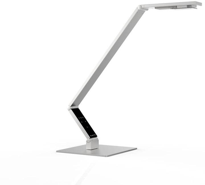 Nowoczesna, minimalistyczna lampa biurkowa z regulowanym ramieniem, wykonana z metalu. Idealna do miejsc pracy, oferująca elastycznie regulowane światło.