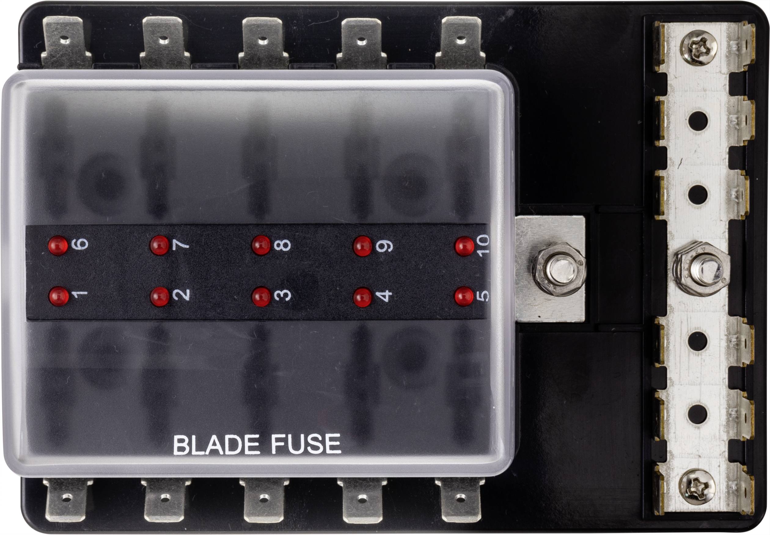 "Skrzynka bezpieczników z dziesięcioma czerwonymi wskaźnikami LED z napisem „BLADE FUSE". Pokazuje dziesięć możliwych miejsc na bezpieczniki oraz szynę uziemiającą."