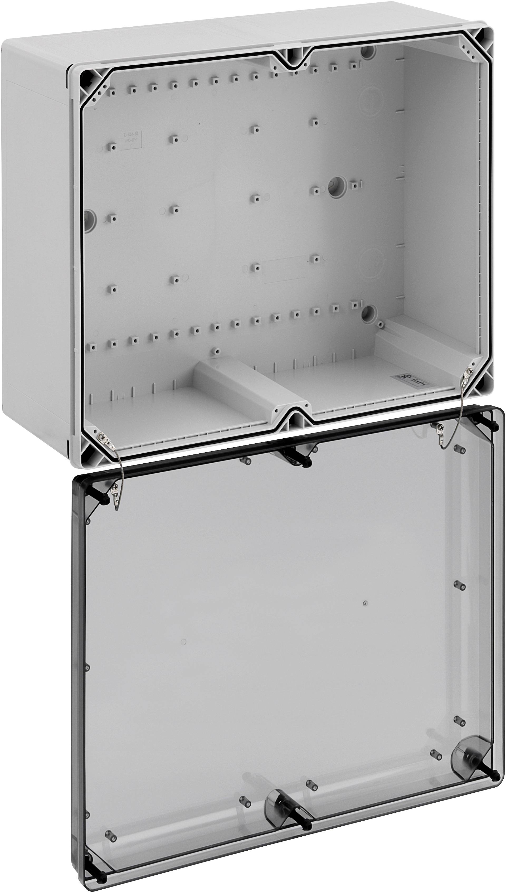 Szaro-biała plastikowa puszka rozgałęźna, prostokątna, z przezroczystą pokrywką.