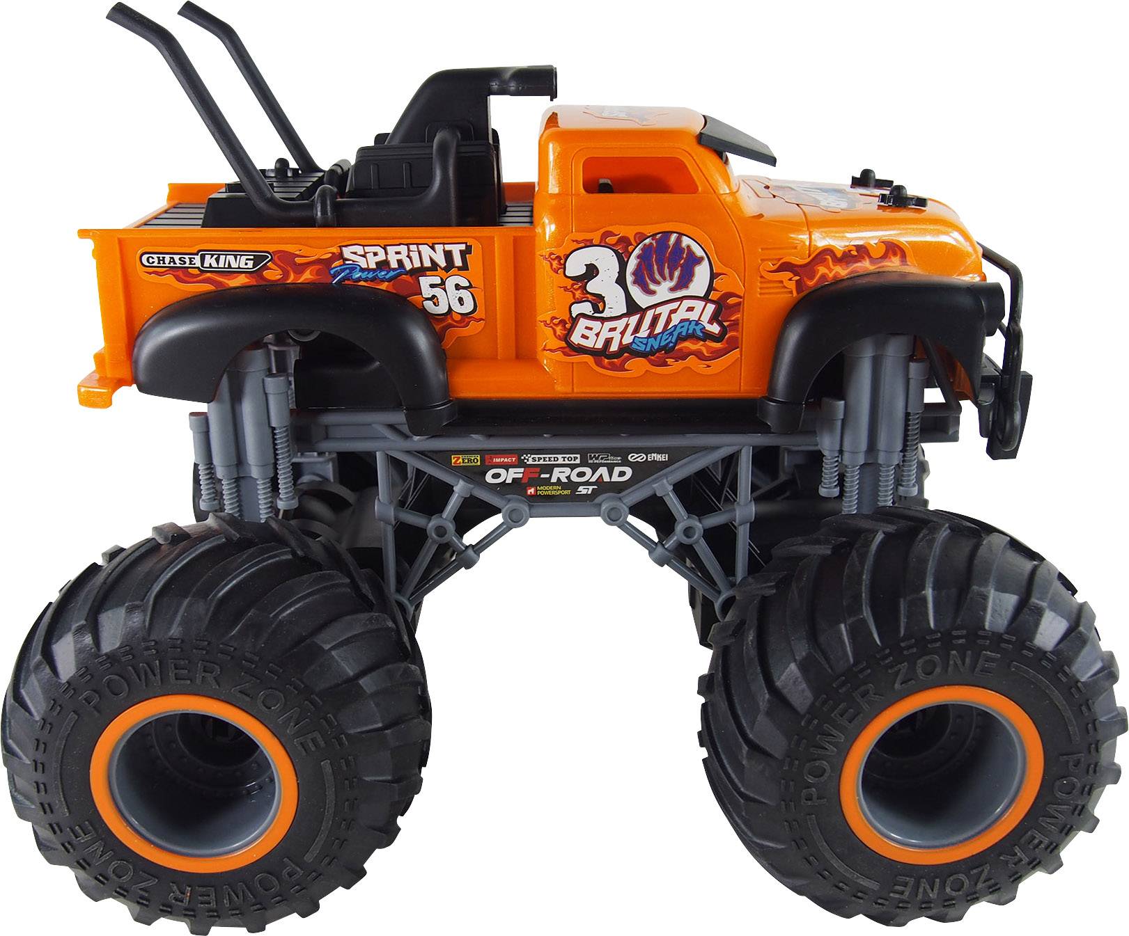 Pomarańczowa zabawkowa ciężarówka monster truck z dużymi czarnymi kołami i numerem '56' na boku.
