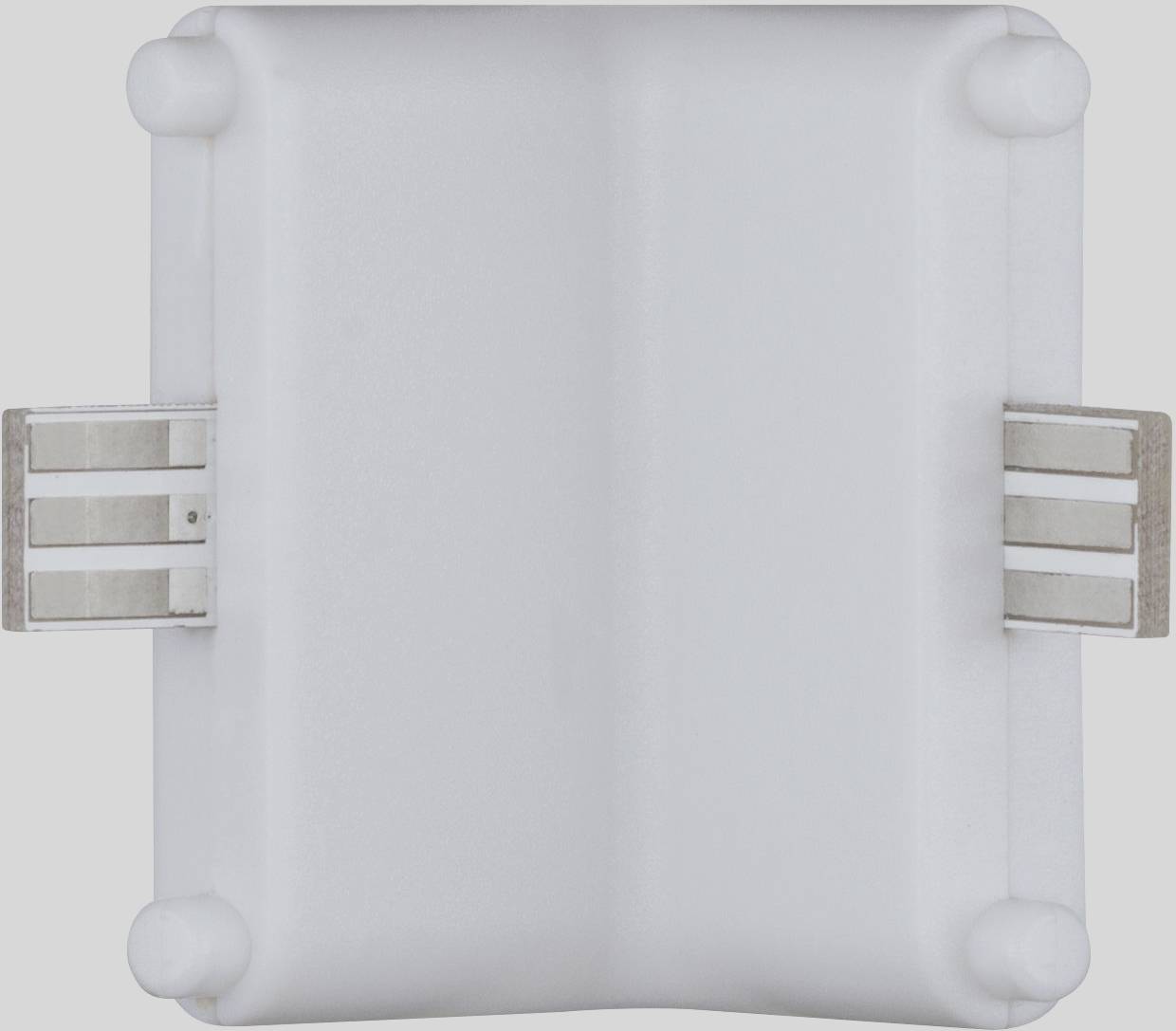 Biały plastikowy zacisk z metalowymi stykami po obu stronach, przeznaczony do łączenia elastycznych pasków LED.