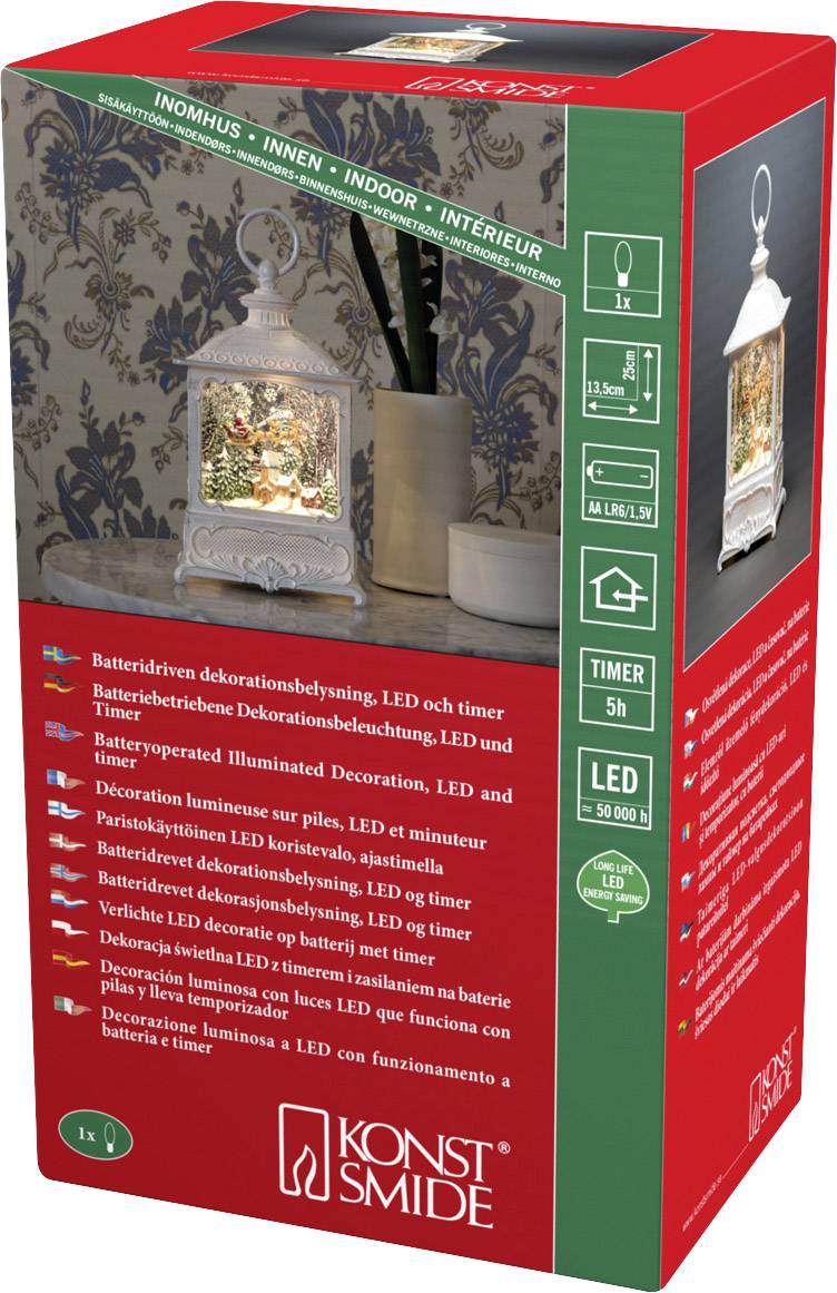 Lampion LED zasilany baterią z funkcją timera. Opakowanie prezentuje produkt we wnętrzu w świątecznej scenerii.