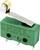 Mały zielony mikrowyłącznik z metalową dźwignią i pozłacanym wałkiem. Nadrukowane specyfikacje techniczne dotyczące obciążalności prądowej są widoczne.