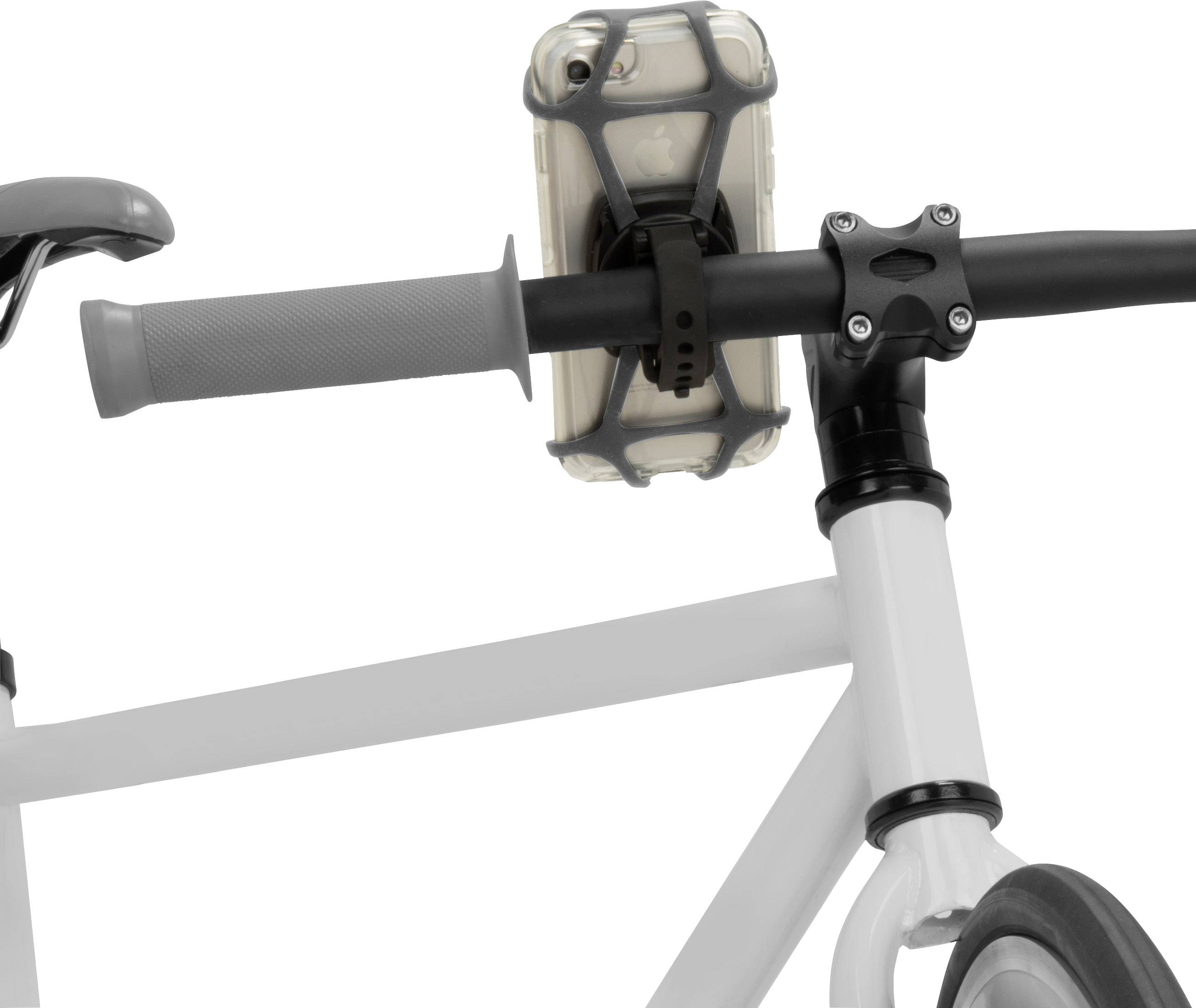 Kierownica roweru z zamontowanym smartfonem w uchwycie, obok szarego uchwytu i ramy roweru.