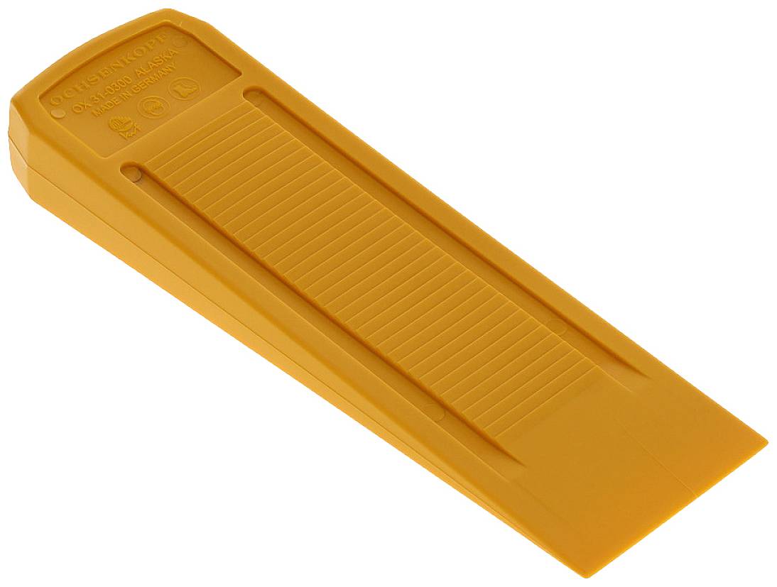 Pomarańczowy klin z tworzywa sztucznego o chropowatej powierzchni, używany głównie jako stopka do drzwi lub do podobnych celów.