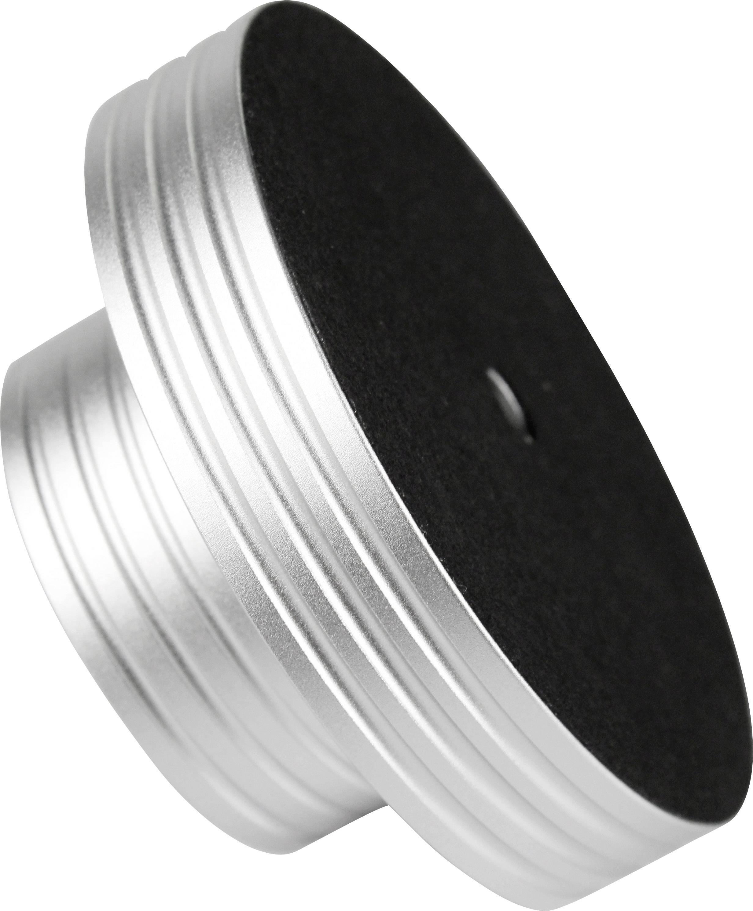 Srebrny metalowy kapsel o prążkowanej strukturze bocznej i czarnej, płaskiej górnej powierzchni.