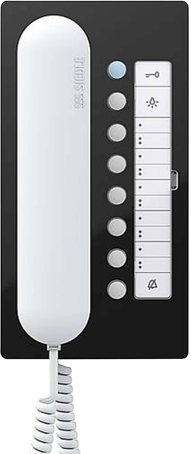 Telefon ścienne w kolorze białym z czarnym panelem sterującym. Po prawej stronie znajdują się przyciski z symbolami oraz regulator głośności.