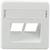 Biała plastikowa osłona z dwoma pustymi otworami na gniazda elektryczne lub włączniki w pomieszczeniu wewnętrznym.