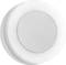 Okrągłe, białe urządzenie z szarym centrum, prawdopodobnie czujnik lub głośnik, na białym tle.