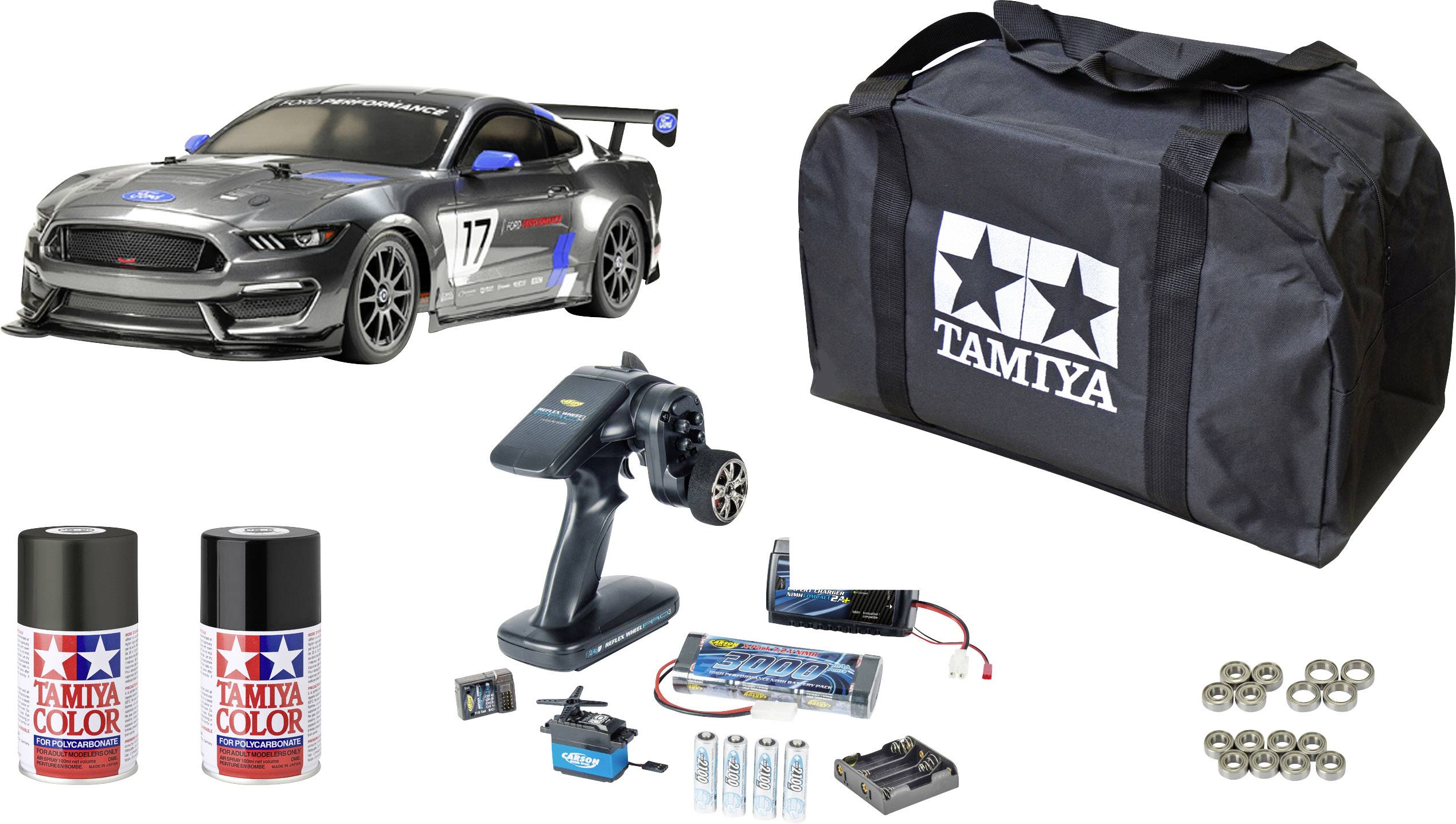 Zestaw RC Auto z szarym samochodem wyścigowym, pilotem, akumulatorami, ładowarką, farbami w sprayu, torbą transportową z logo TAMIYA, łożyskami kulkowymi.