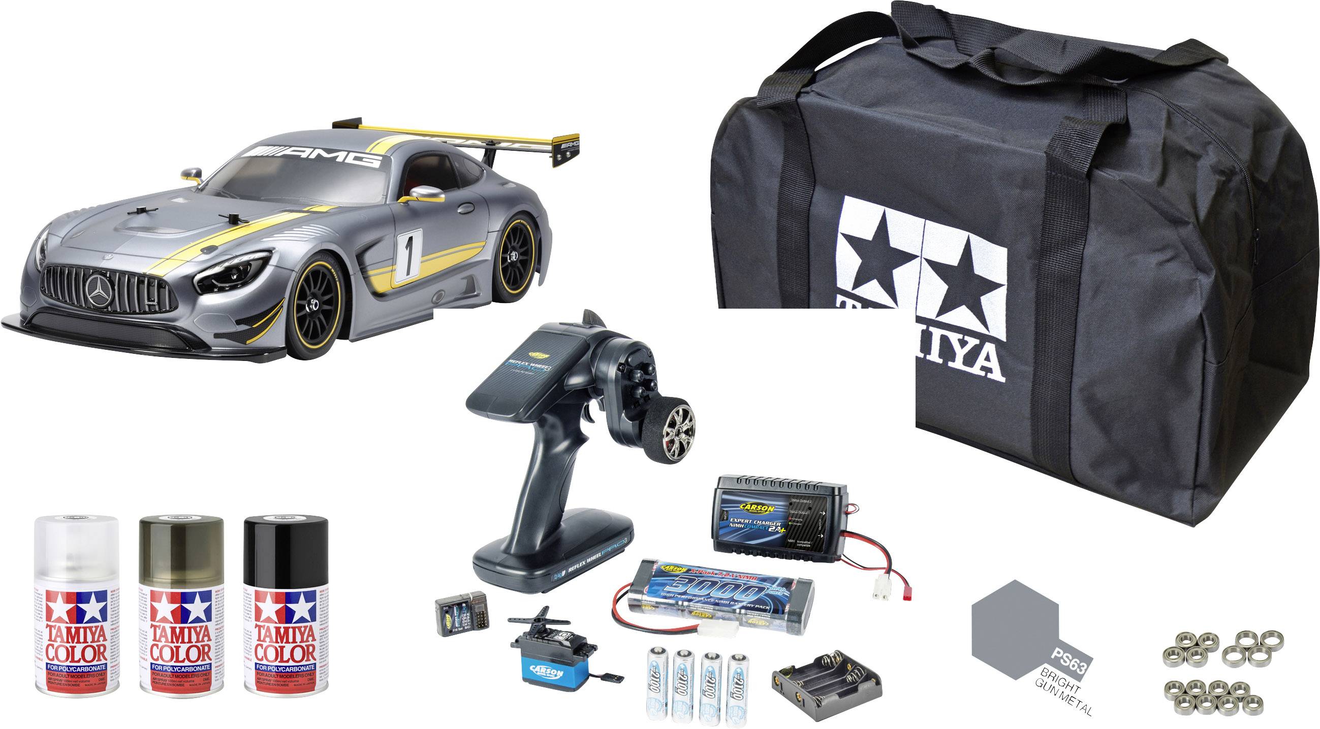 Zestaw 'RC Mercedes-AMG GT3' z samochodem zdalnie sterowanym, kolorami lakierniczymi, pilotem, akumulatorami, ładowarką, akcesoriami i torbą transportową.