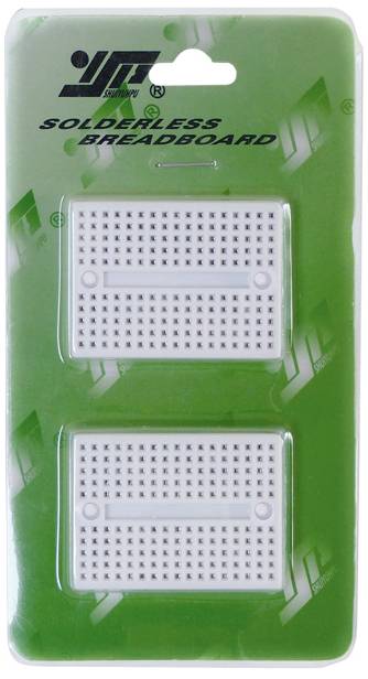 Dwie bezlutownicowe płytki stykowe na zielonej obudowie z napisem 'Bezlutownicowa płytka montażowa'. Idealne do elektronicznych projektów majsterkowiczów.