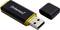 Czarny pendrive z żółtą ramką i zdjętą nakładką, marki 'Intenso'.