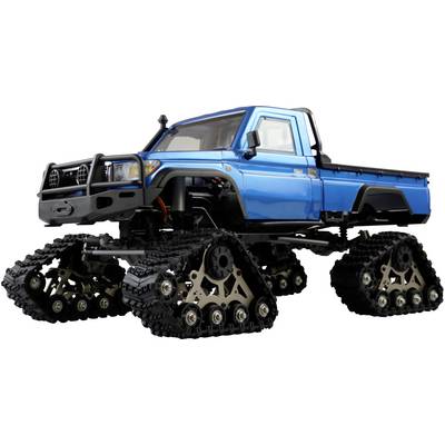 Niebieski truck z gąsienicowym mechanizmem jazdy zamiast kół, przystosowany do trudnego terenu.