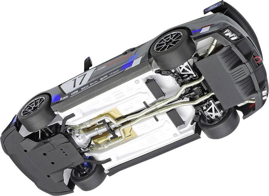 Zabawkowy samochodzik widziany od spodu, ukazujący szczegóły podwozia i kół. Numer '17' jest widoczny na boku modelu.