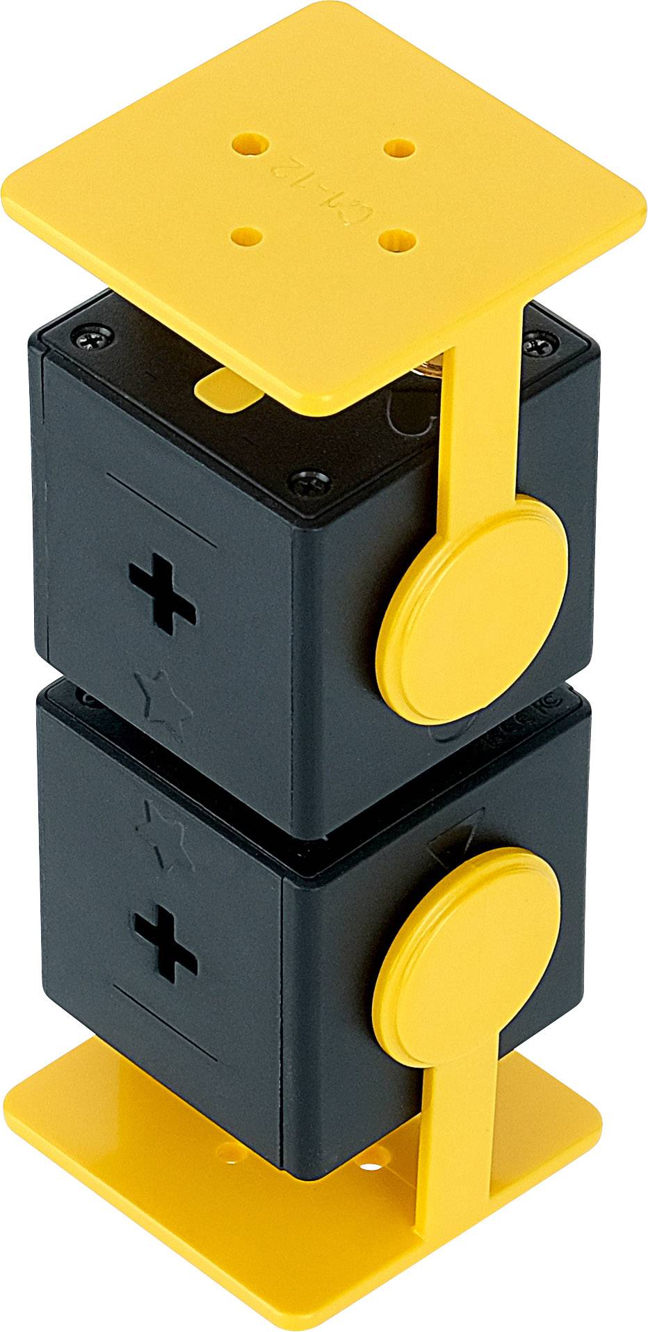 Czarno-żółty moduł plastikowy z możliwymi do układania sześcianami i żółtymi płytkami na każdym końcu. Połączony żółtymi klipsami bocznymi.