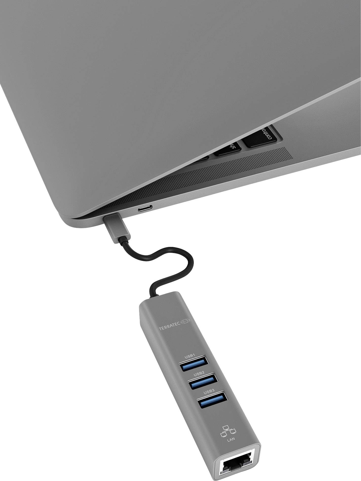 Laptop jest podłączony do koncentratora USB, który oferuje trzy porty USB i jeden port LAN.