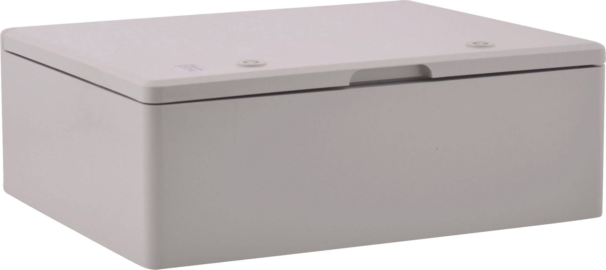 Prostokątne, płaskie, zamknięte pudełko w kolorze szarym o lekko zaokrąglonych narożnikach.