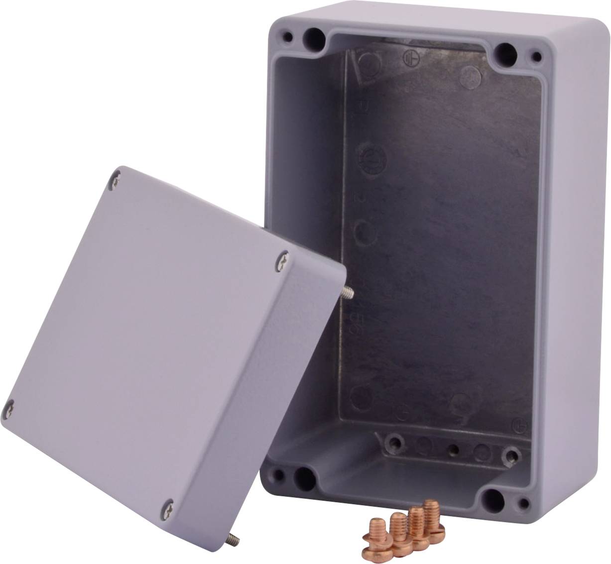 Szare, puste plastikowe pudełko z otwartą pokrywą, obok którego leżą śruby do mocowania.