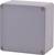 Szara, prostokątna obudowa z czterema śrubami w narożnikach, stosowana do osadzania obwodów elektrycznych lub urządzeń.
