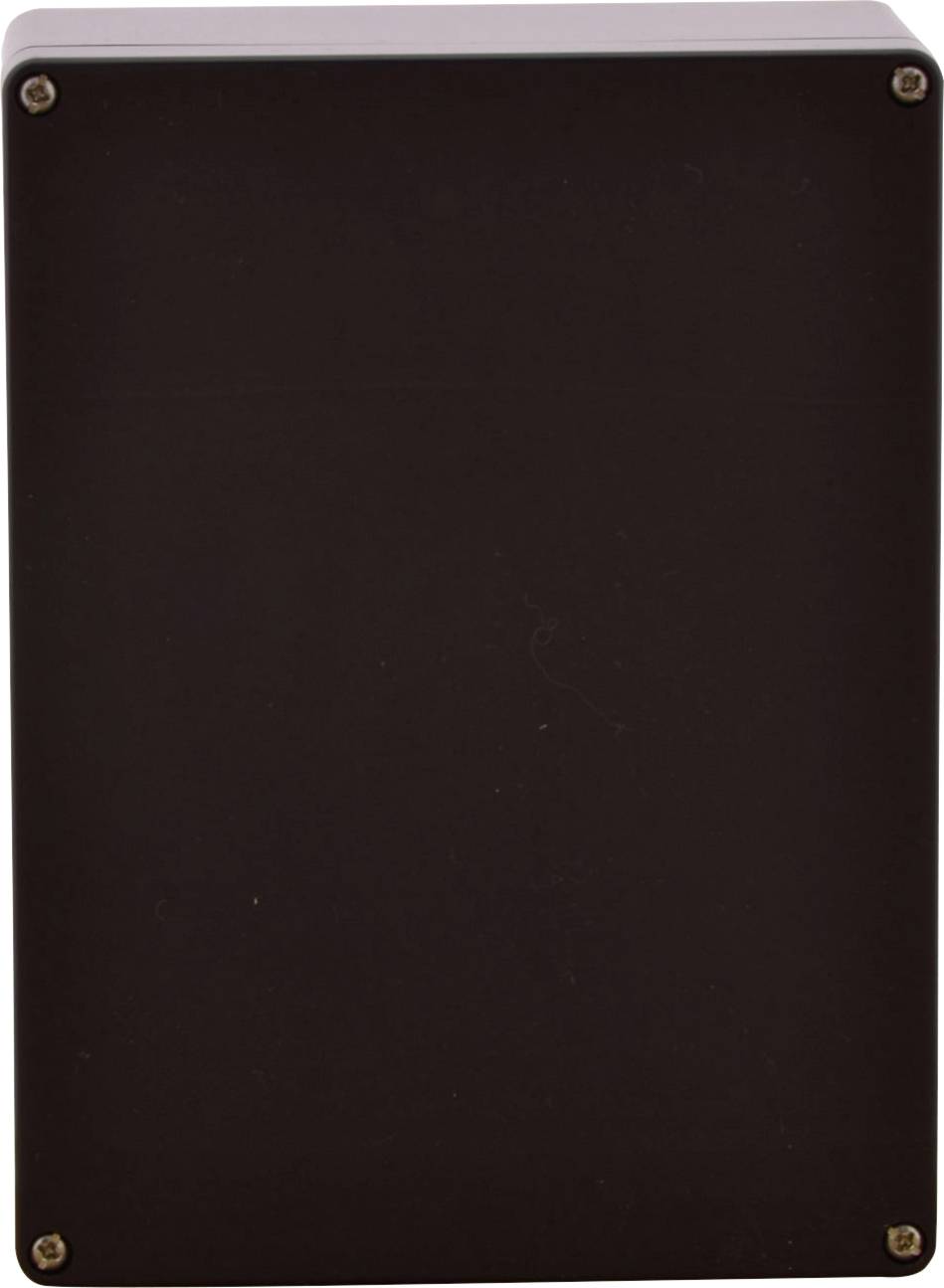 Prostokątna, ciemnbrązowa obudowa z czterema śrubami mocującymi w narożnikach, zamontowana na białej powierzchni.