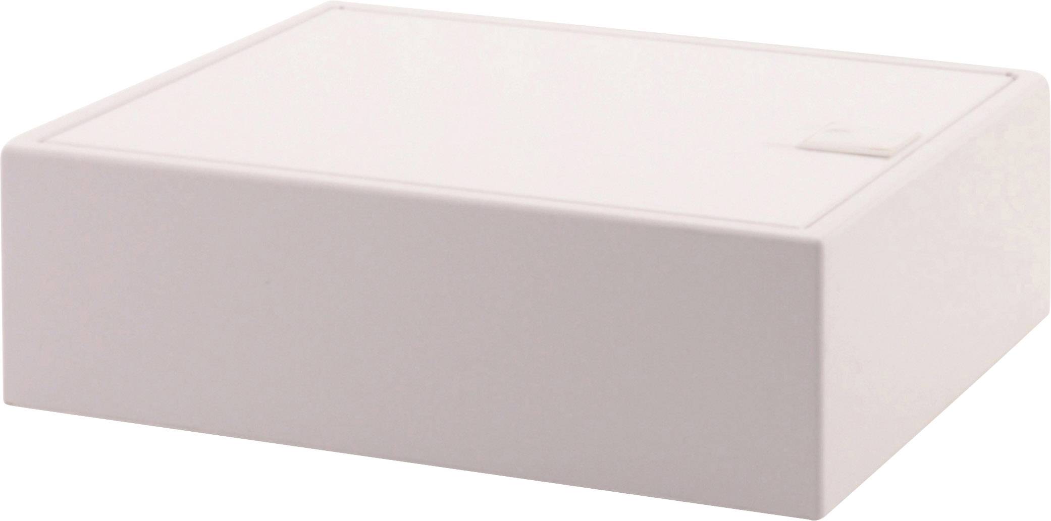 Biała, prostokątna obudowa z płaską pokrywą, odpowiednia dla urządzeń elektronicznych. Posiada gładką powierzchnię i zaokrąglone narożniki.