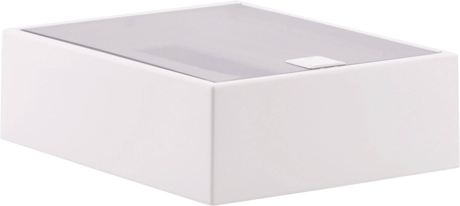 Biała, prostokątna pudełko upominkowe z przezroczystą pokrywką, sfotografowane lekko z góry.