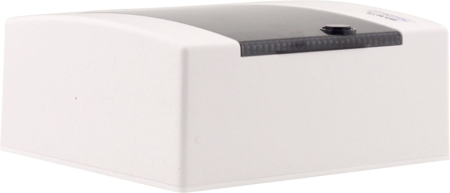 Białe urządzenie elektryczne o krzywiźnie powierzchni z czarną górną częścią.