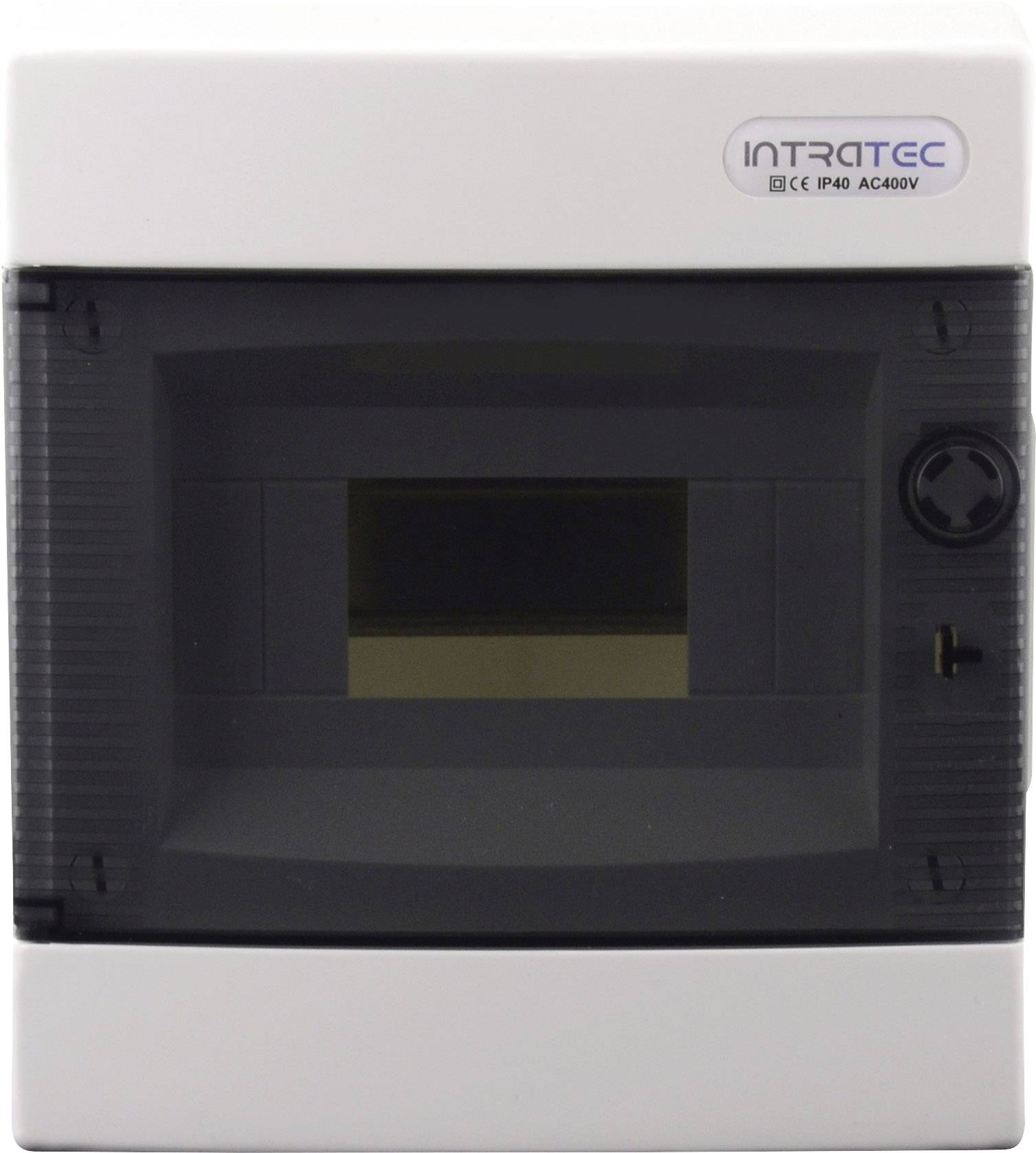 Mały, biały rozdzielacz elektryczny z czarną pokrywą, przeznaczony do montażu naściennego. Logo producenta w prawym górnym rogu.