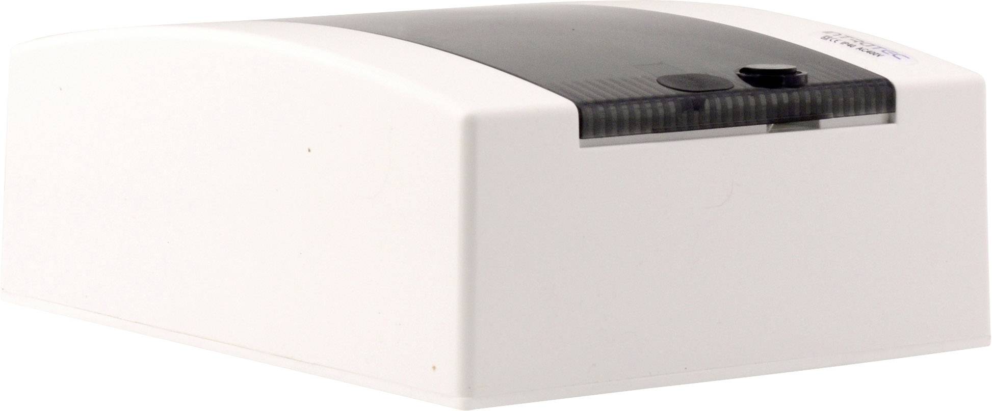 Białe, prostokątne urządzenie elektroniczne z przezroczystą pokrywą, prawdopodobnie sprzęt biurowy lub laboratoryjny.