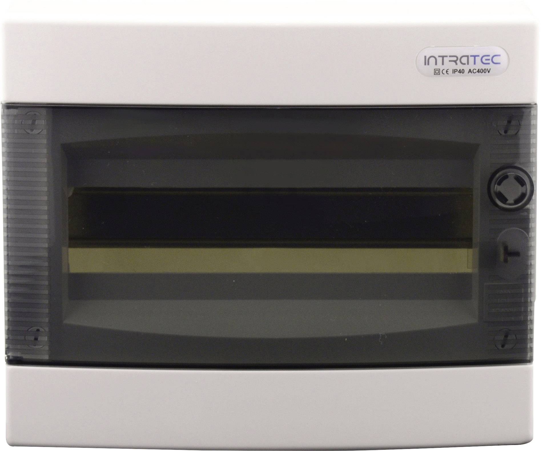 Białe, prostokątne obudowa elektryczna z czarną pokrywą i przezroczystym oknem, przeznaczona do użytku wewnętrznego.