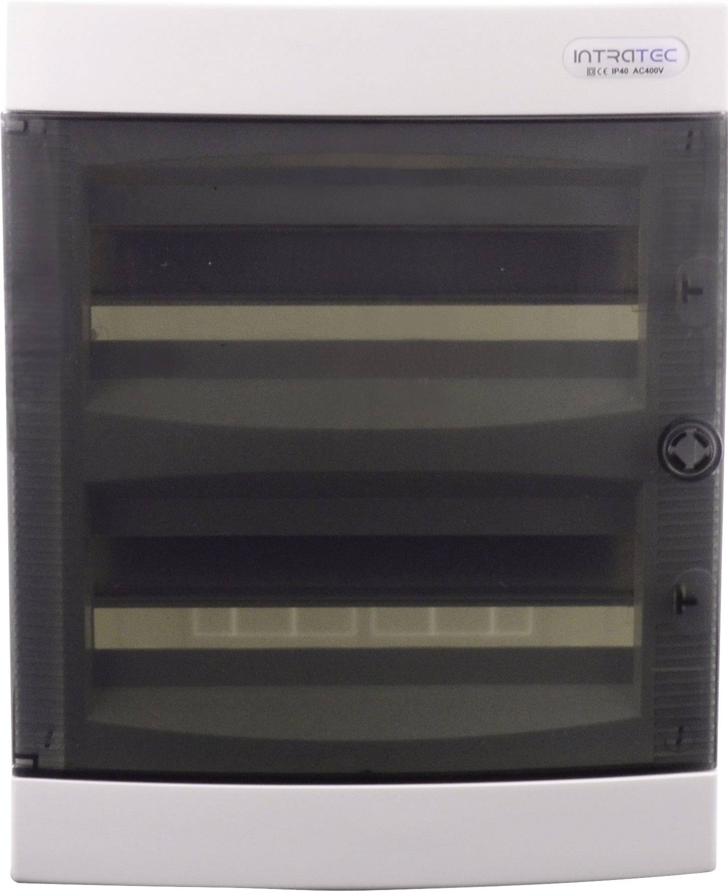 Szara skrzynka bezpiecznikowa z przezroczystą plastikową pokrywą i bocznym mechanizmem zamykającym, przeznaczona do bezpiecznej dystrybucji prądu.