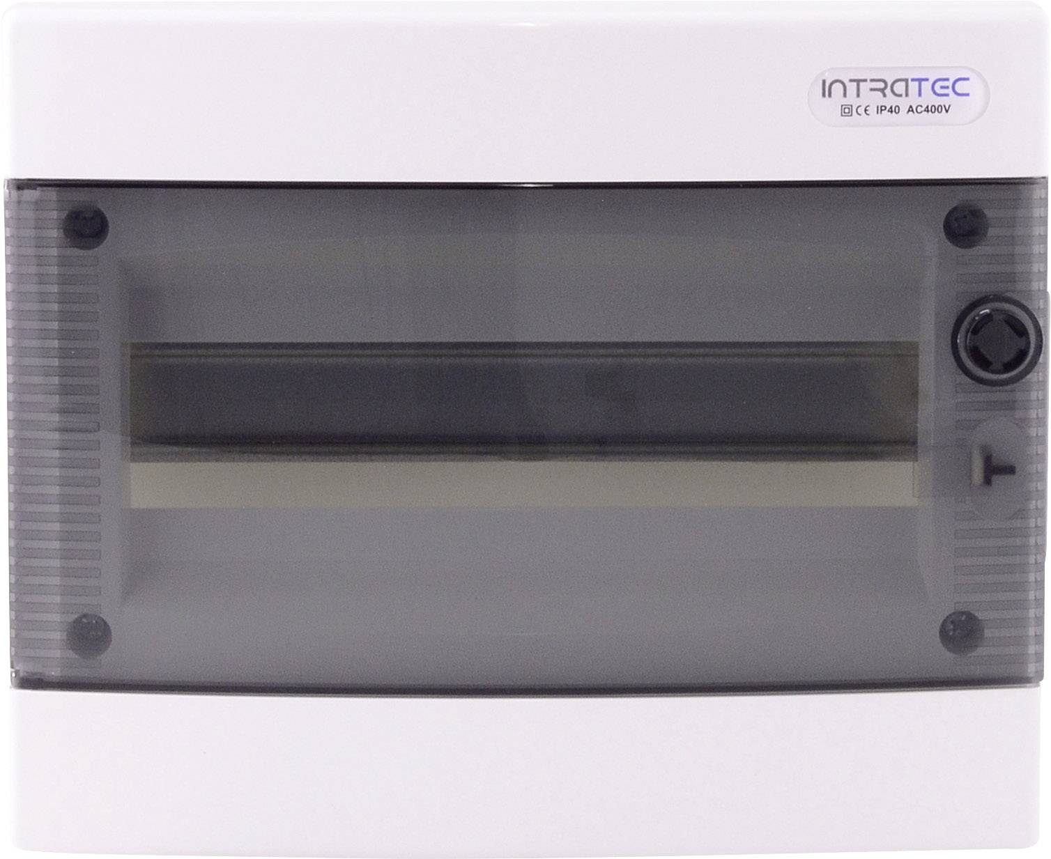 Biały skrzynkowy rozdzielacz elektryczny z przezroczystym szarym pokrowcem i pokrętłem po prawej stronie. Oznaczony napisem 'INTRATEC'.
