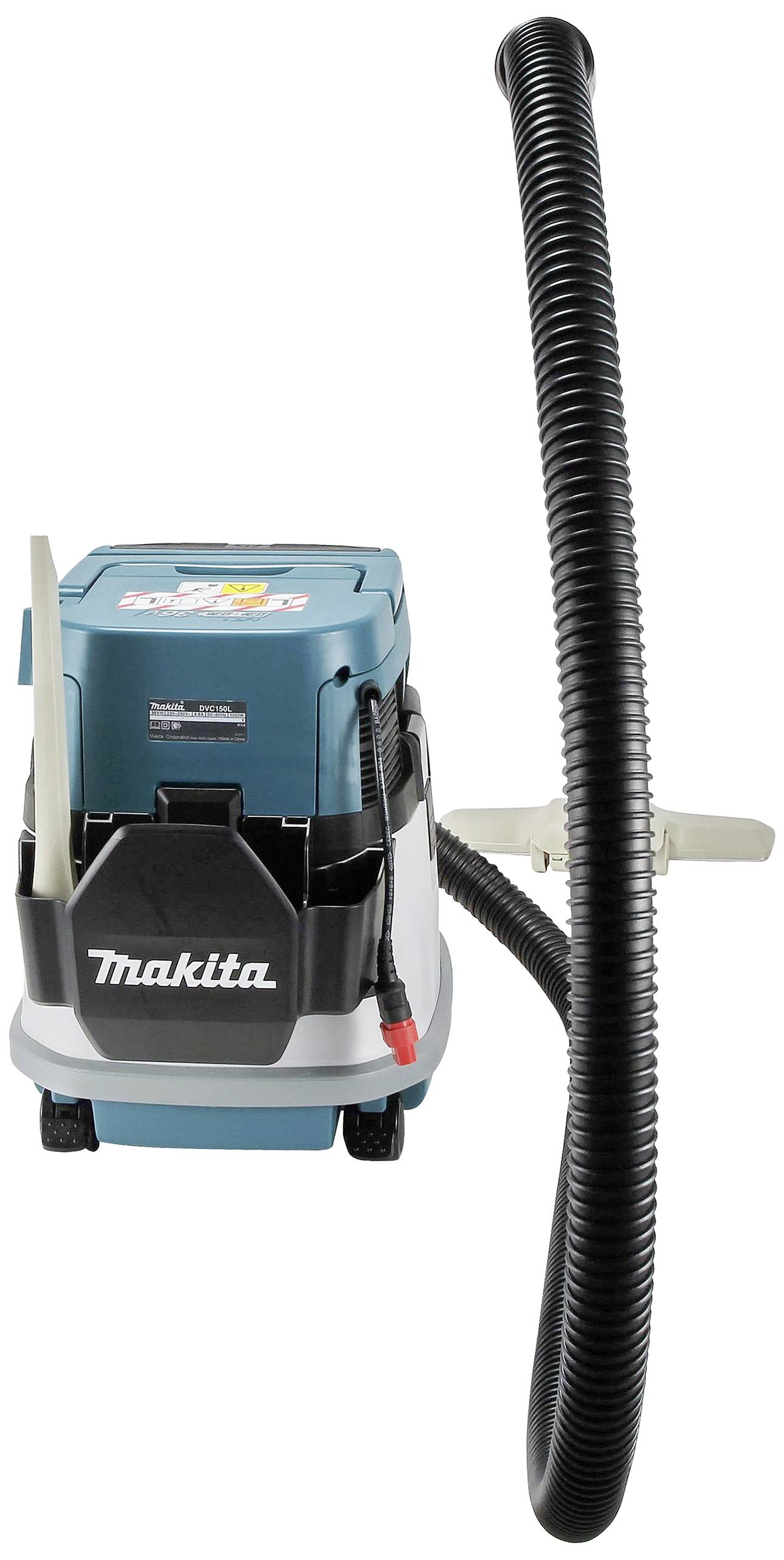 Przemysłowy odkurzacz firmy Makita o wytrzymałej konstrukcji, przeznaczony do użytku na placach budów lub w warsztatach. Z przodu wyraźnie widoczny jest wąż ssący.
