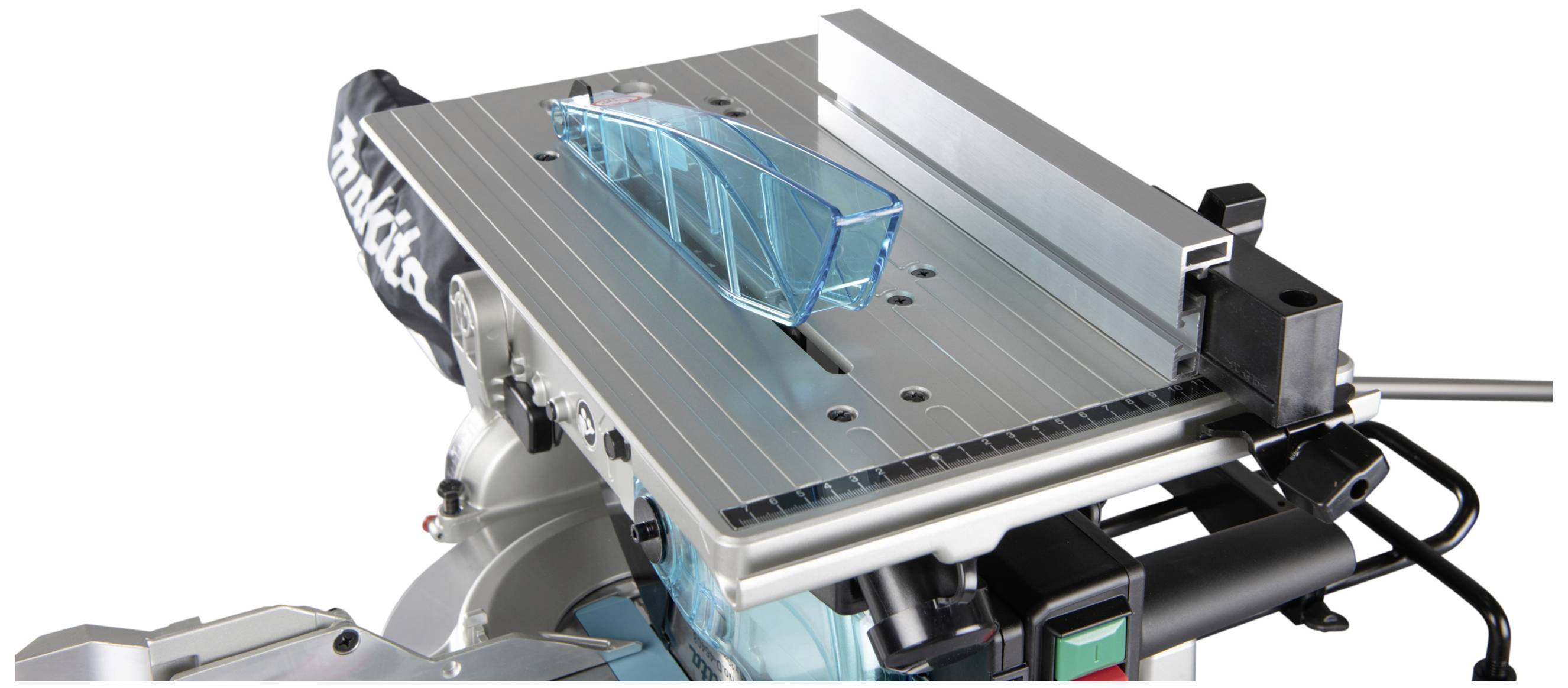 Kompaktowa pilarka stołowa z osłoną ochronną, idealna do precyzyjnego cięcia drewna. Stół do cięcia z prowadnicą liniową i systemem odpylania.