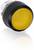 Żółty przycisk wciskany na białym tle, głównie używany do sterowania lub na panelach sterowania urządzeń.