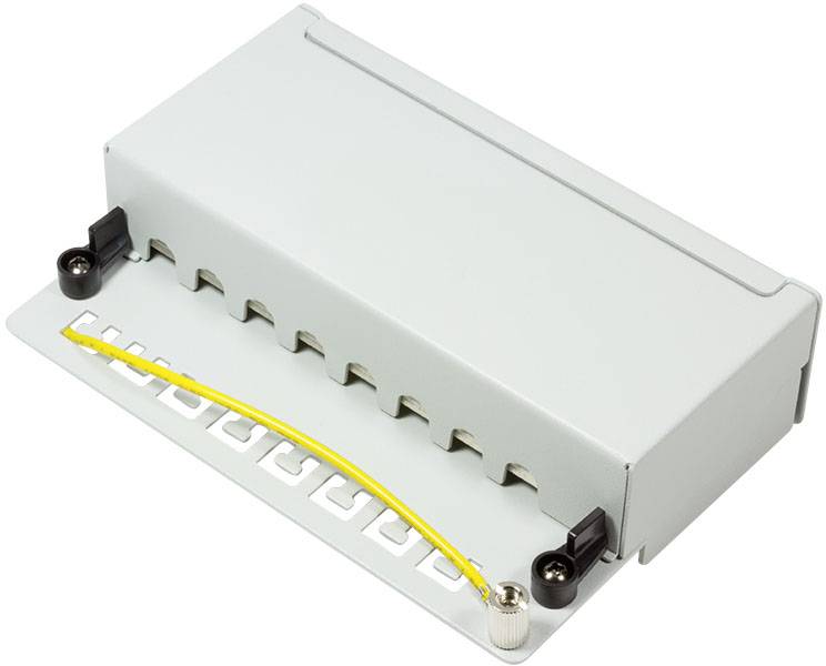 Szaro-białe, prostokątne urządzenie elektryczne z wieloma złączami i żółtym gniazdem kablowym.