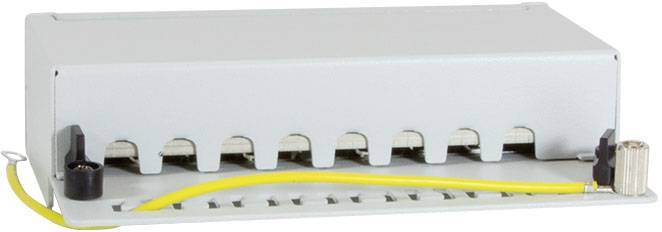 Szary elektroniczny sprzęt z wieloma złączami z przodu, dwoma czarnymi zaciskami i żółtym przewodem uziemiającym po bokach.