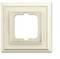 Beżowe ramki maskujące do włączników światła lub gniazdek elektrycznych z kwadratowym otworem pośrodku, przeznaczone do montażu na beżowej ścianie.