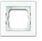 Kwadratowa, biała ramka włącznika światła bez centralnego przełącznika. Posiada błyszczącą powierzchnię i jest przeznaczona do montażu podtynkowego.