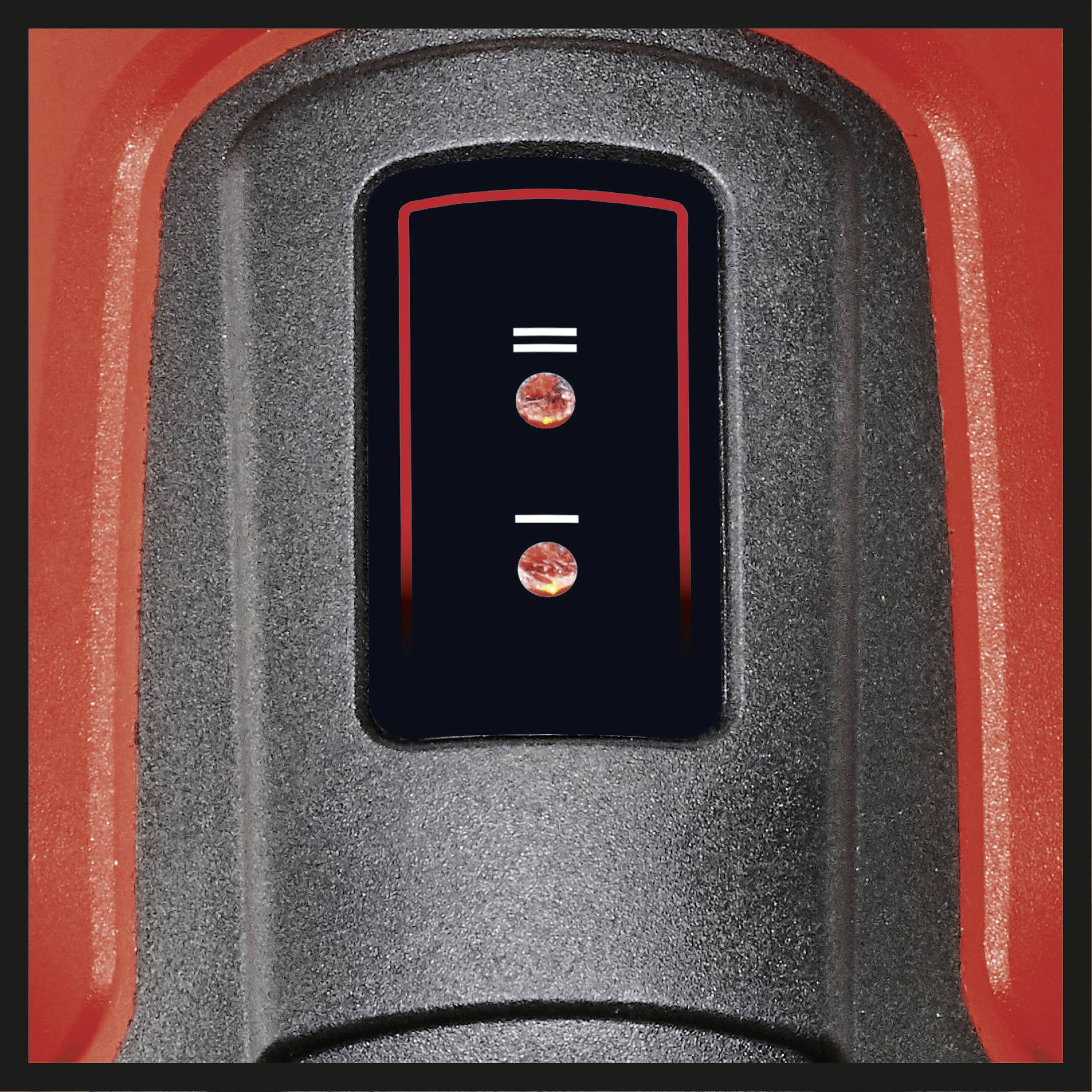 Czarna płyta sterująca z dwoma świecącymi czerwonymi lampkami, umieszczonymi na środku obudowy obramowanej czerwoną krawędzią.