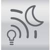 Symbol księżyca obok żarówki i sygnału radiowego, który prawdopodobnie przedstawia tryb nocny lub technologię oszczędzania energii.