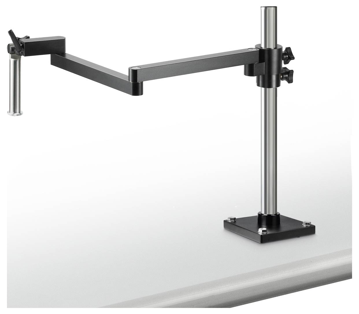 Ergonomiczny metalowy uchwyt na monitor z regulowanym przegubem, zamontowany na biurku, zapewnia elastyczne ustawienie ekranu.