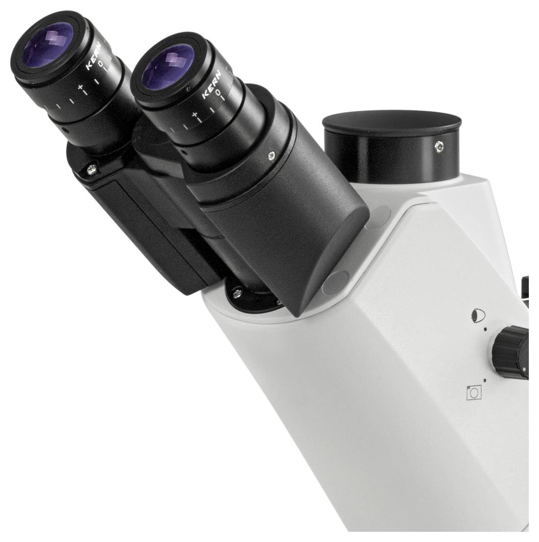 Mikroskop z dwoma okularami, regulowanym nachyleniem i wyświetlaczem czarno-białym, do obserwacji próbek lub obiektów mikroskopowych.